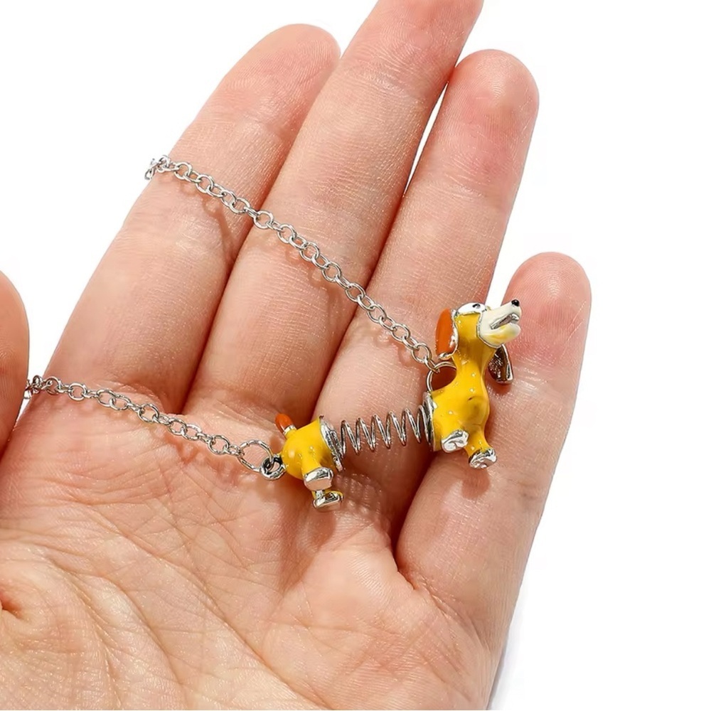 ⭐️NEW⭐️ Toy Story Slinky Dachshund Dog Pendant Necklace - Picture 6 of 8